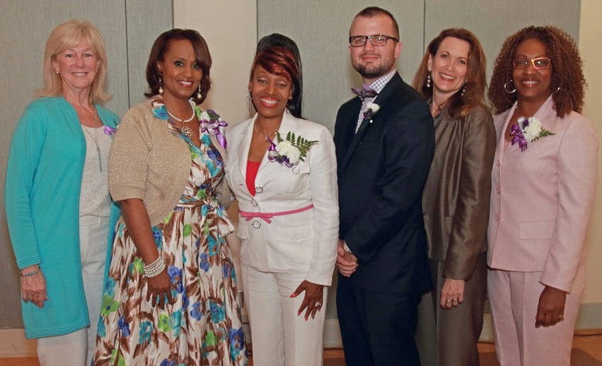 Diane Deese poses for a group photo at a Missing Our Mothers event